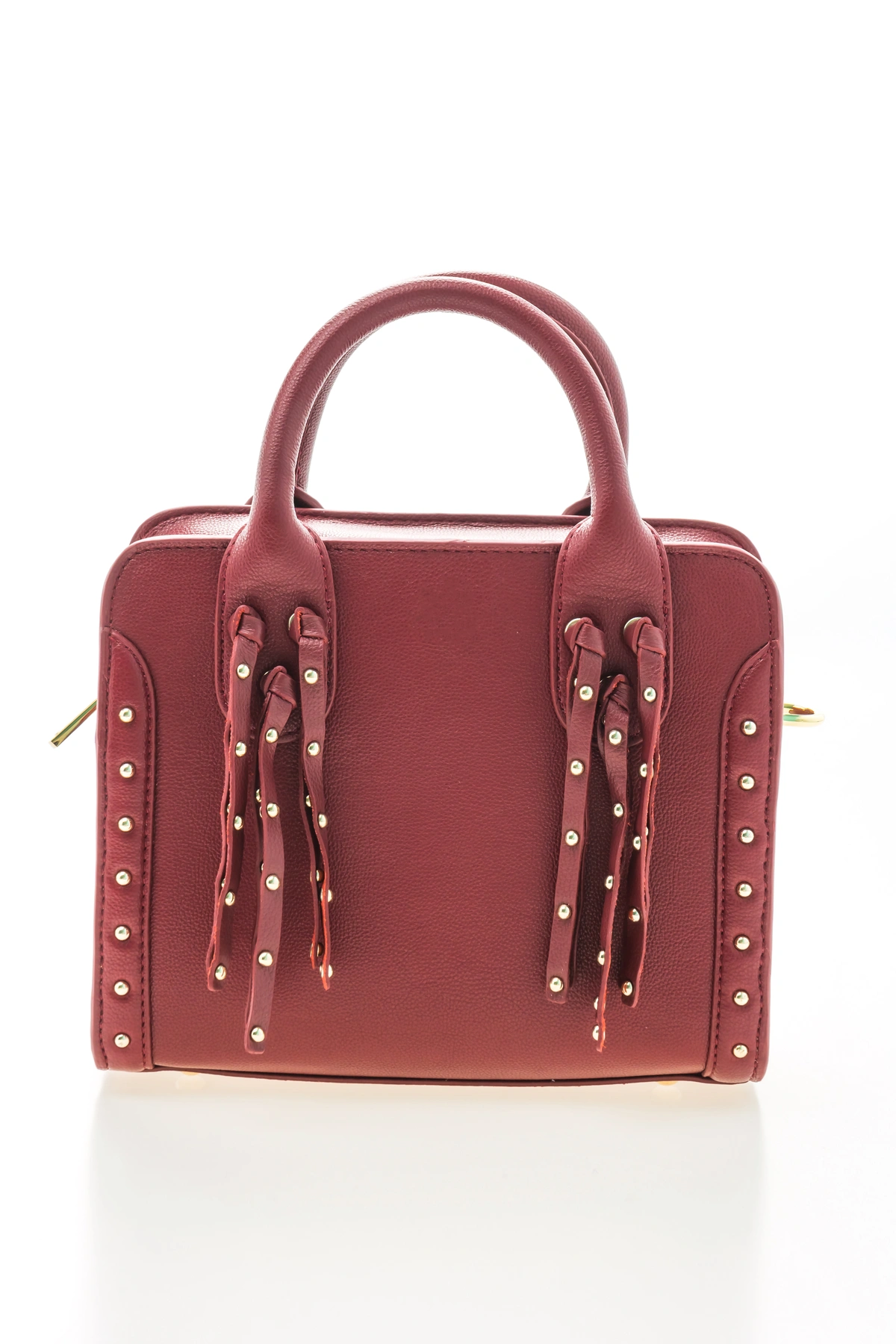 Red leather handbag with gold accents and a stylish design, perfect for a chic and trendy look
